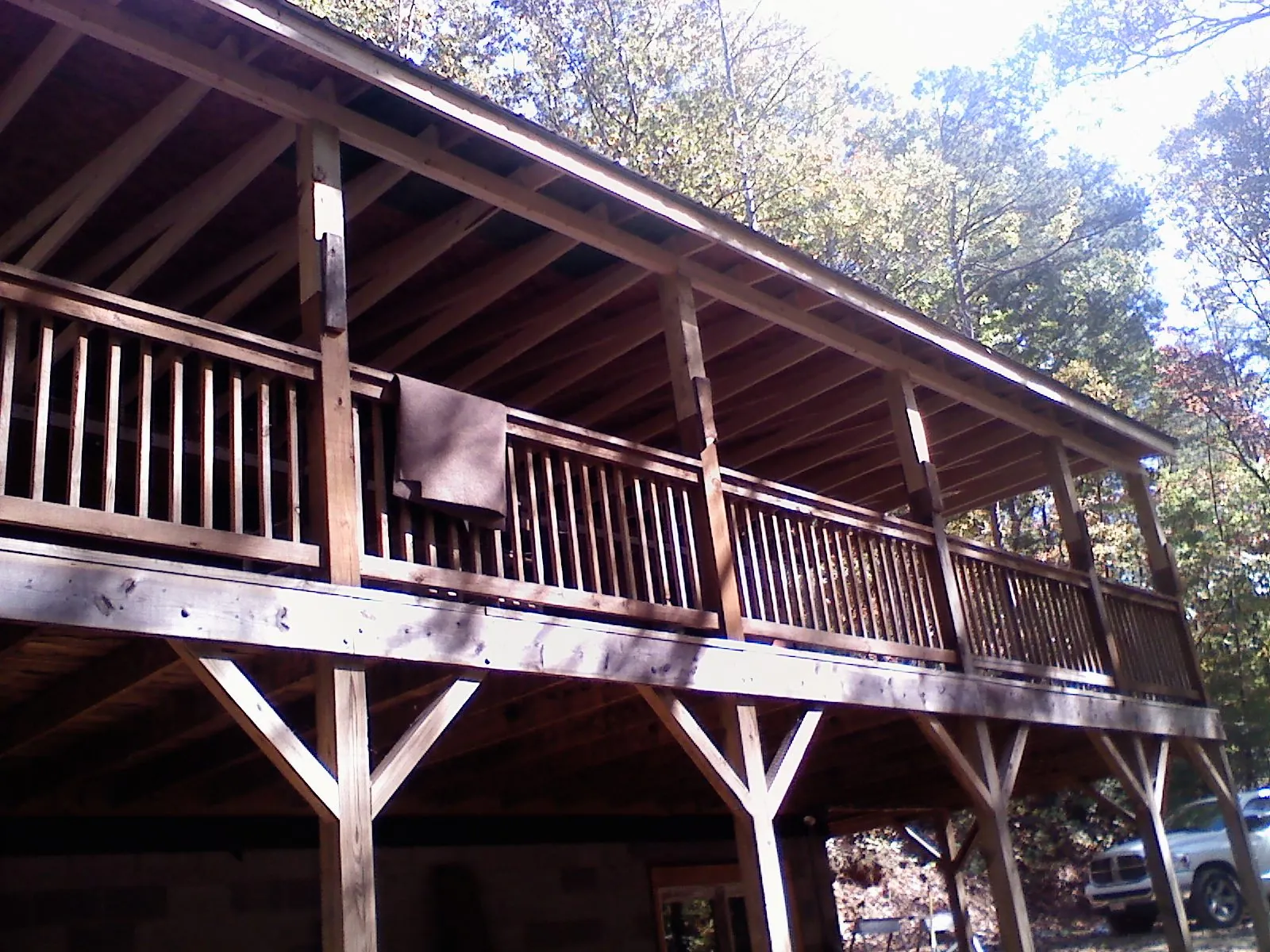 Timber framing under a new elevated porch and deck — Roof Leak Repair in Northboro by Roofing Brothers